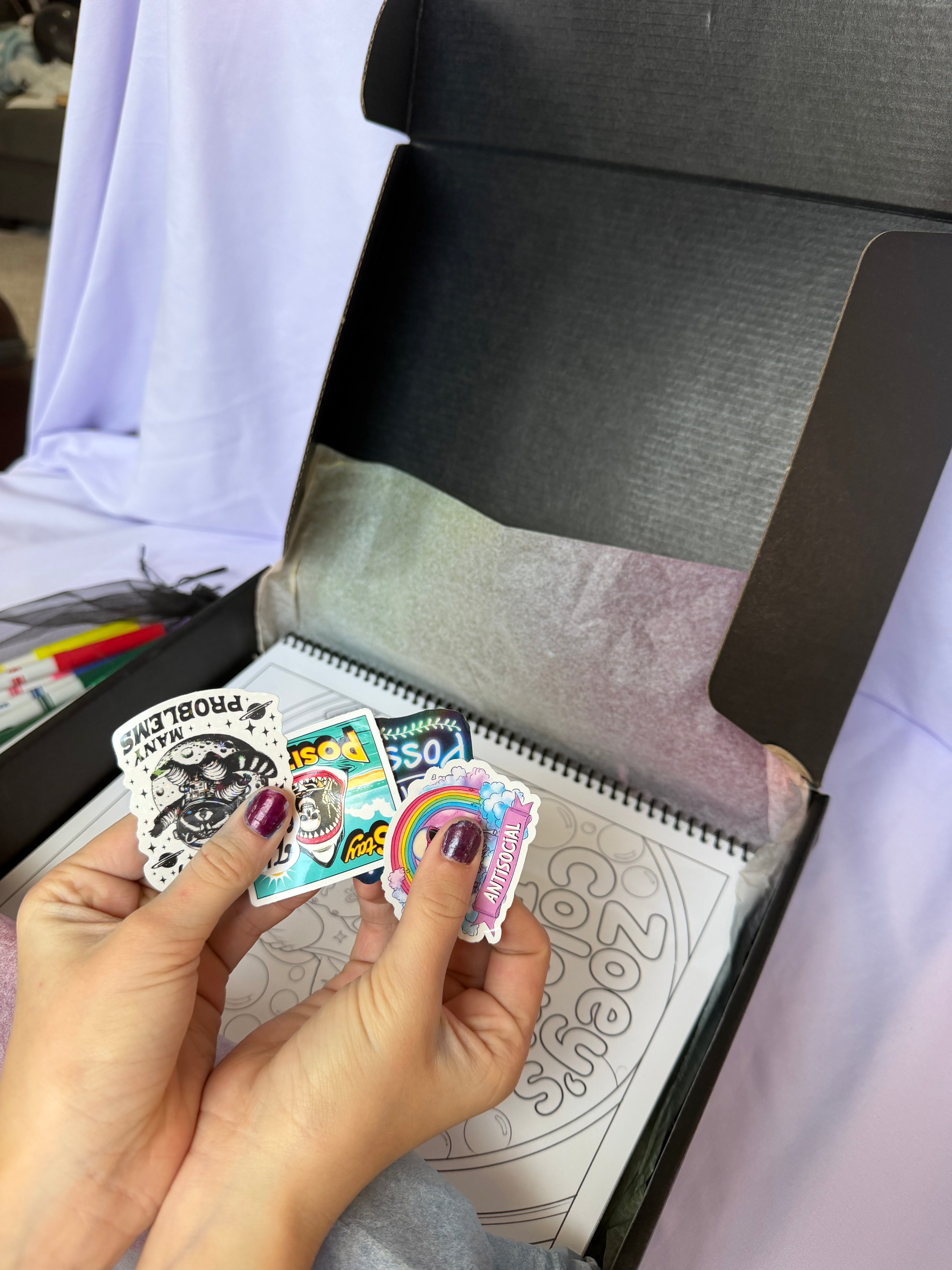 Decorative stickers included with the personalized coloring book gift set