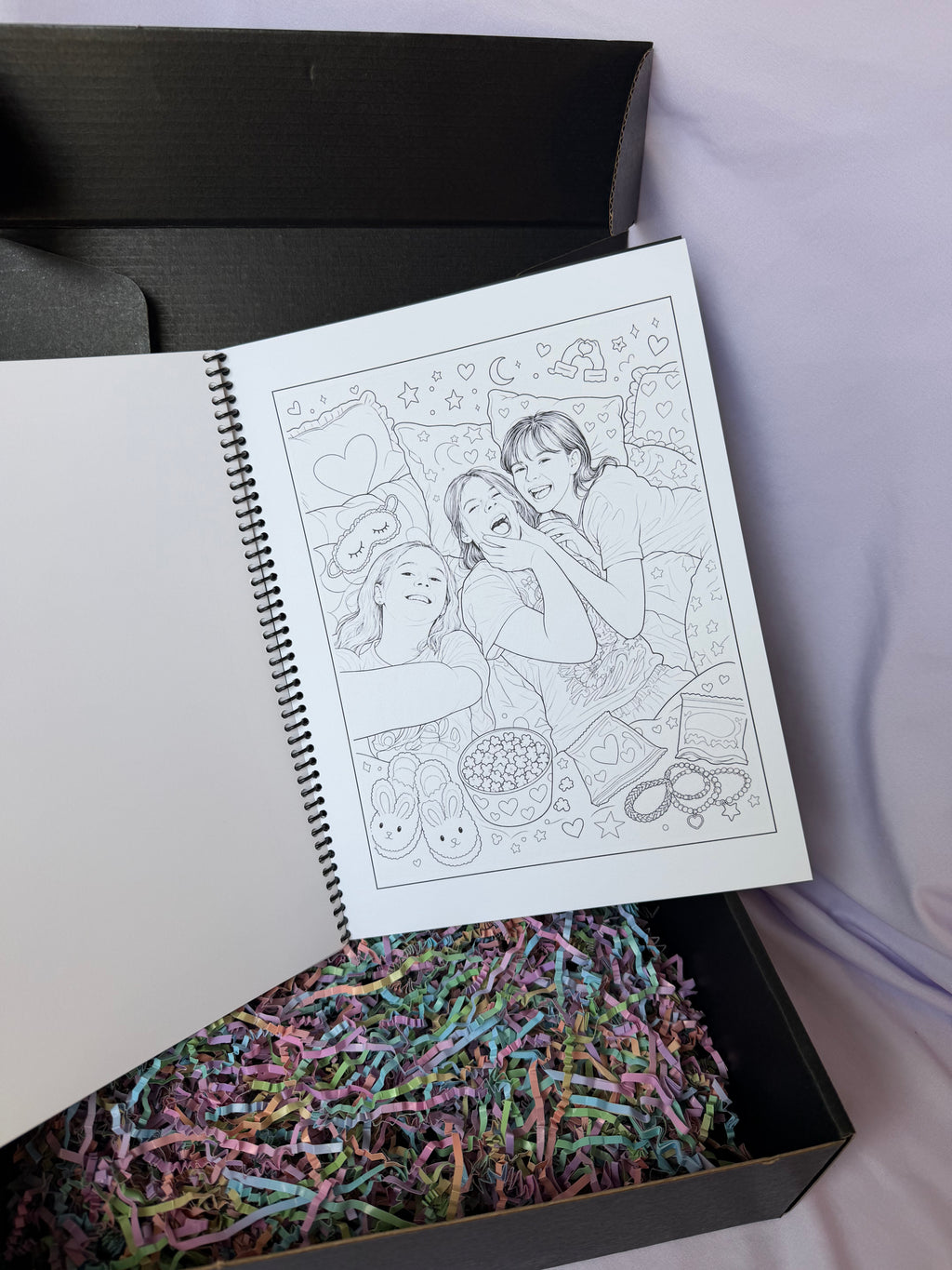 Personalized family photo coloring page in a spiral-bound book