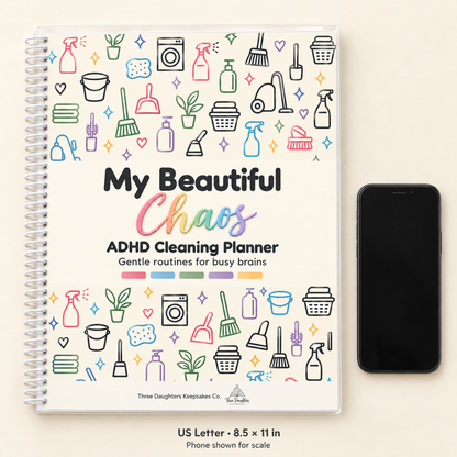 Letter size 8.5 x 11 inch spiral bound ADHD cleaning planner shown next to a smartphone for scale