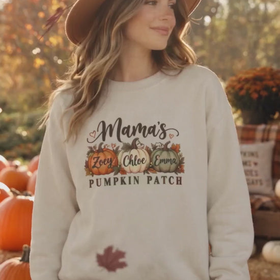 Woman wearing the Personalized Mama's Pumpkin Patch crewneck sweatshirt in Sand at a fall pumpkin patch