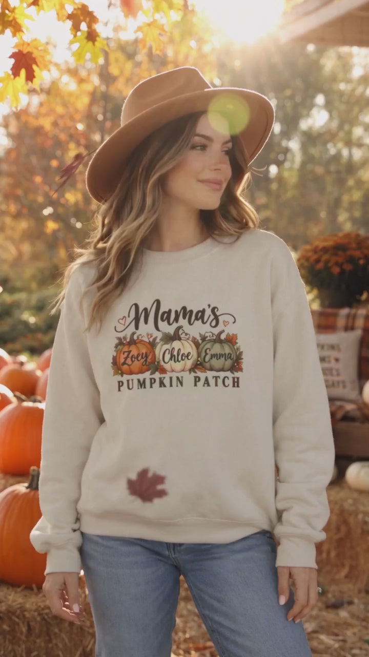 Woman wearing the Personalized Mama's Pumpkin Patch crewneck sweatshirt in Sand at a fall pumpkin patch